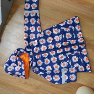 Blue raincoat with orange flowers